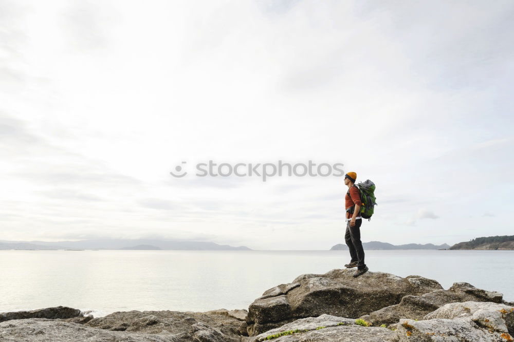 Similar – Tourist man at lake Man