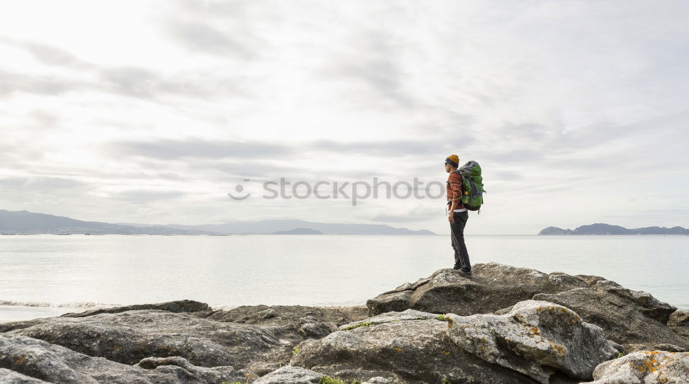 Similar – Tourist man at lake Man