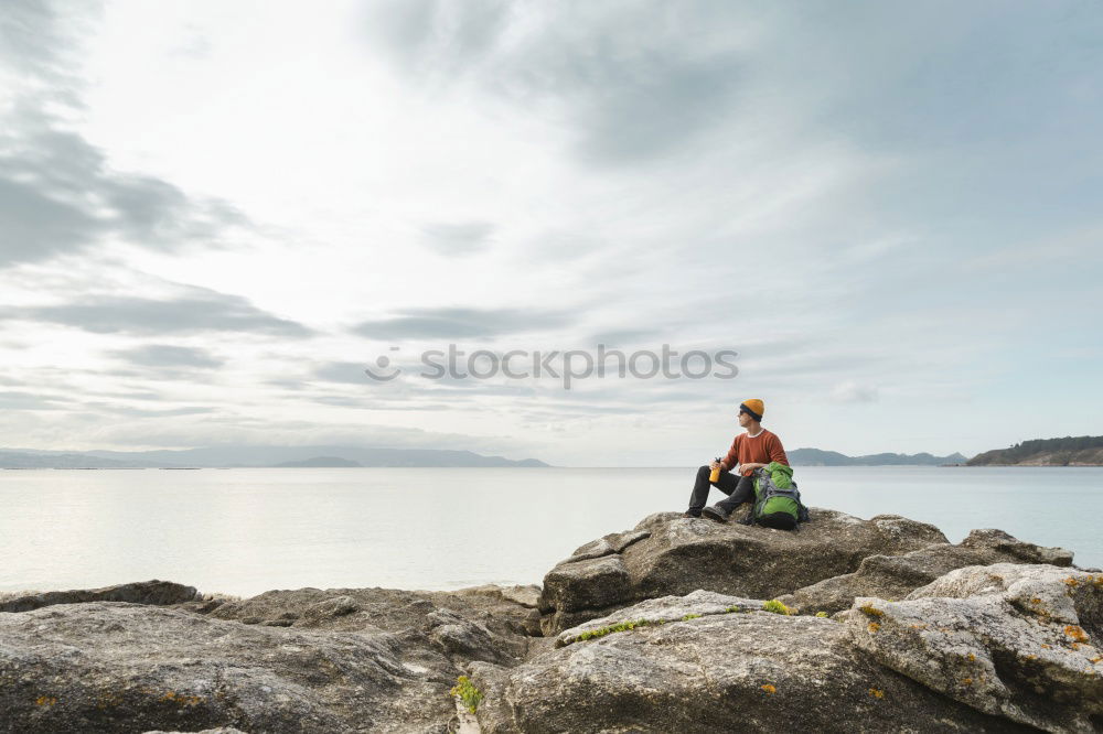 Similar – Tourist man at lake Man