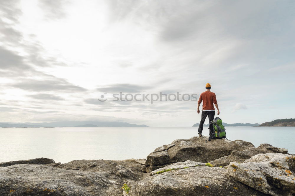 Similar – Tourist man at lake Man