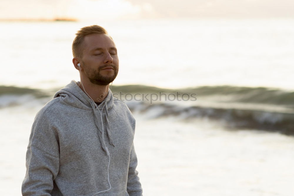 Similar – Image, Stock Photo Man standing on rocky beach