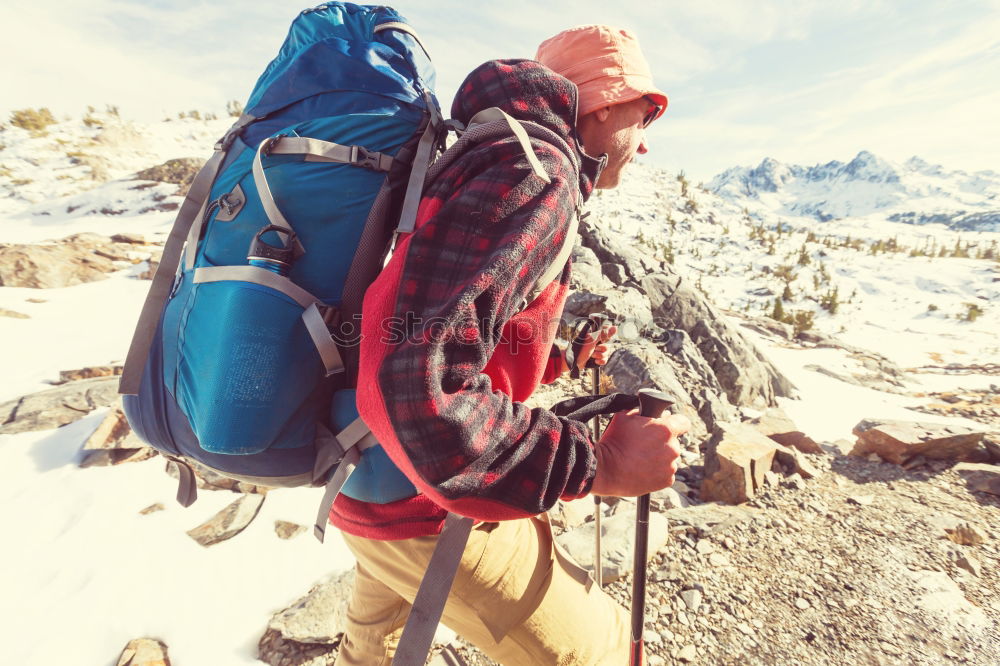 Similar – Image, Stock Photo Boy using the mobile phone during the winter trip