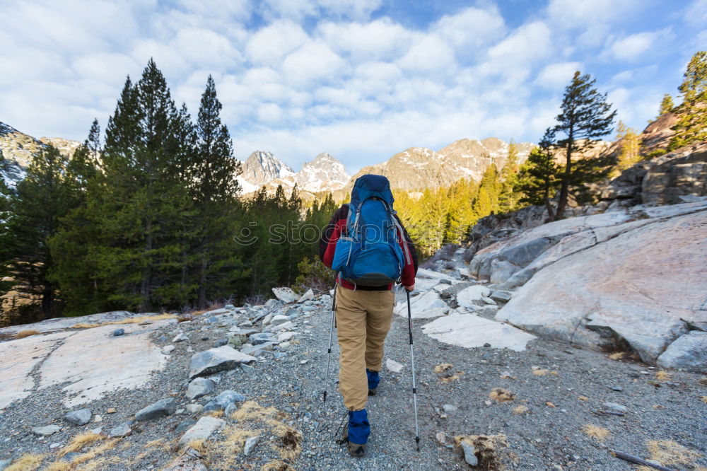 Similar – Woman walks and looks into the mountains