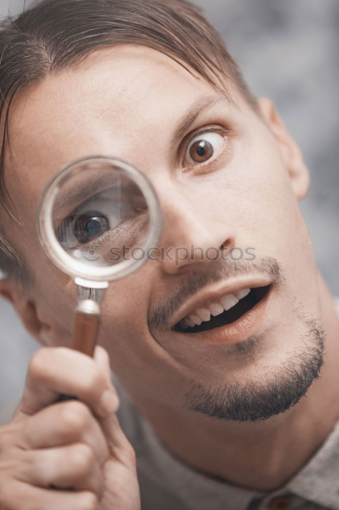 Similar – Viewer Magnifying glass