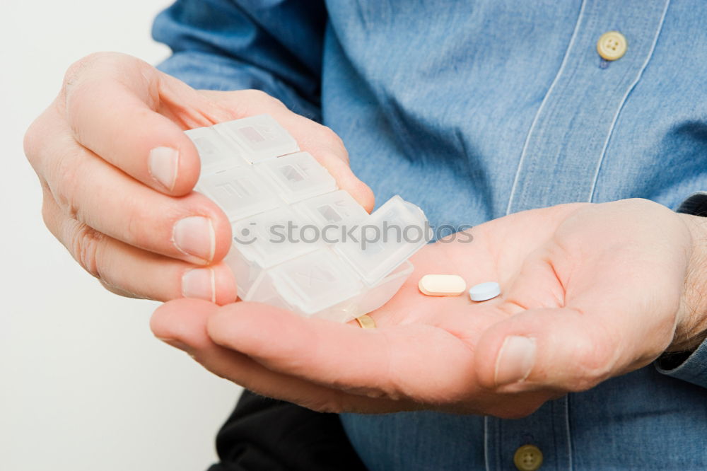 Similar – White blisters with drugs on dark