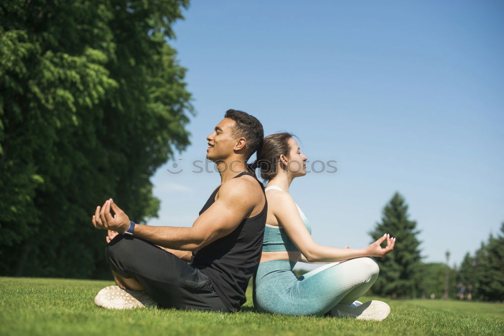 Similar – Image, Stock Photo Mother and daughter doing yoga exercises on grass in the park at the day time