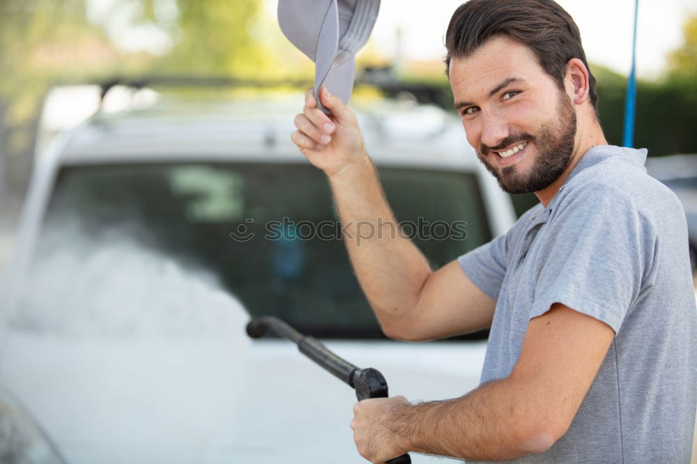 Image, Stock Photo Man worker washing car with sponge