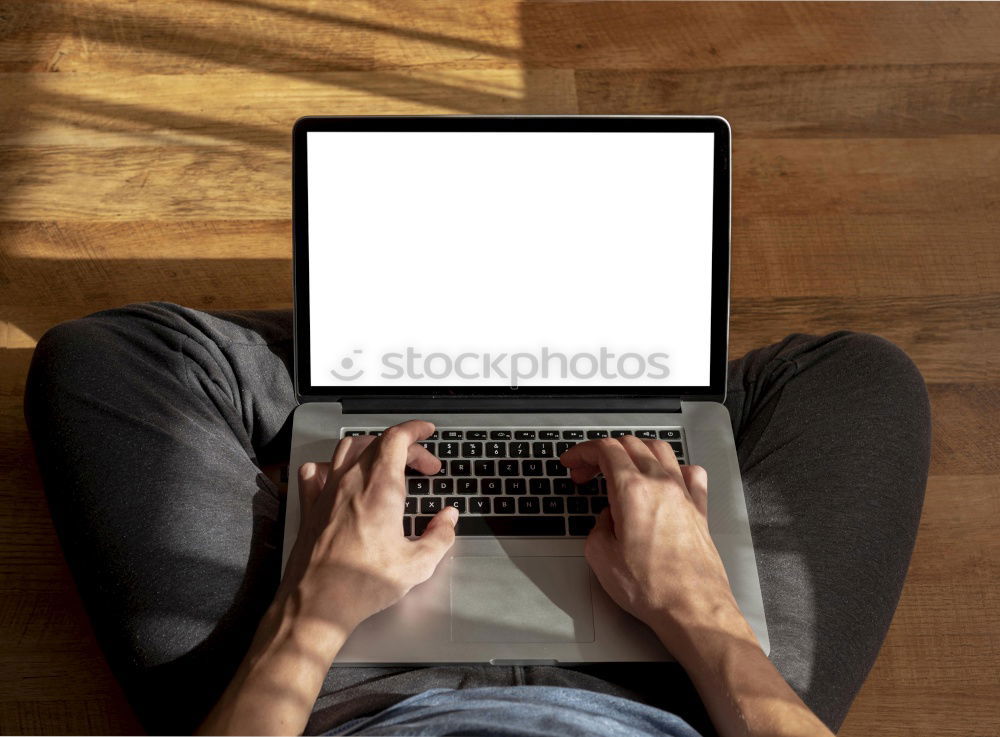 Similar – Young man writing in notebook