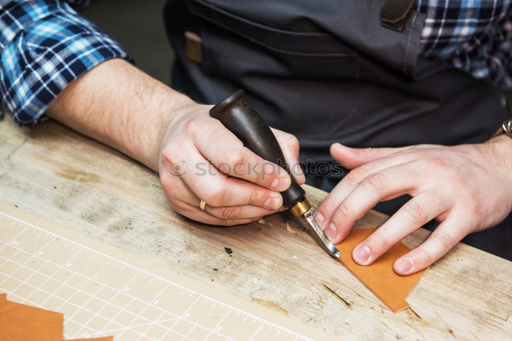 Similar – Hands making shoes