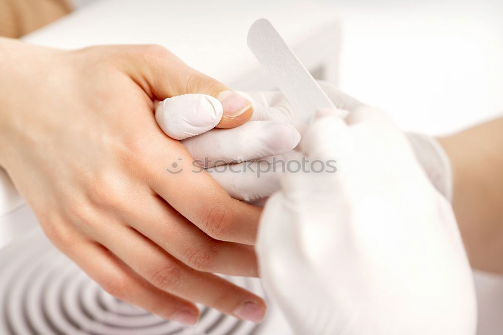 Similar – Image, Stock Photo Woman buttoning up wedding dress on lady