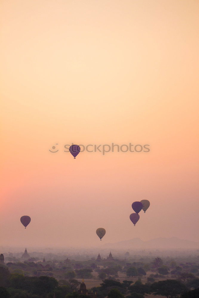 Similar – Image, Stock Photo Birds and hot air balloons above Bagan