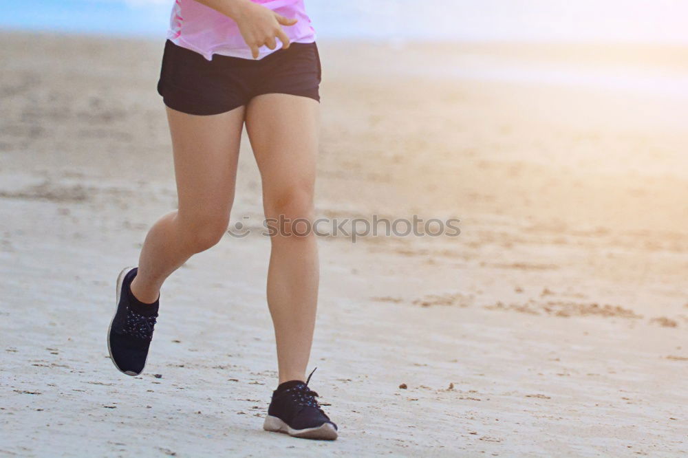 Similar – Young sporty woman jogging