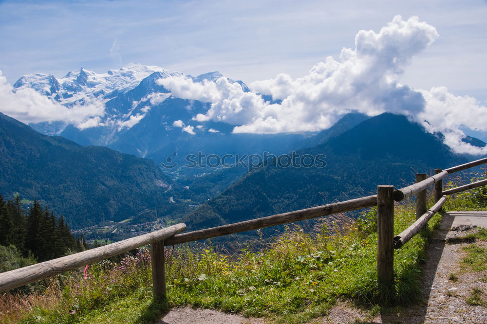 Similar – View of the Nockberge mountains from a bench