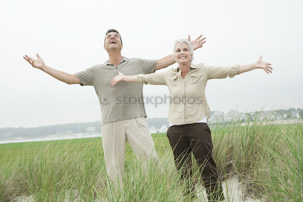 Similar – Image, Stock Photo Father and son playing superhero on the beach at the day time. People having fun outdoors. Concept of summer vacation and friendly family.