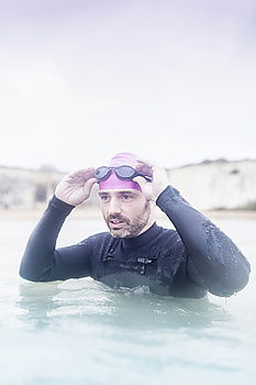 Similar – Diver posing in water Man