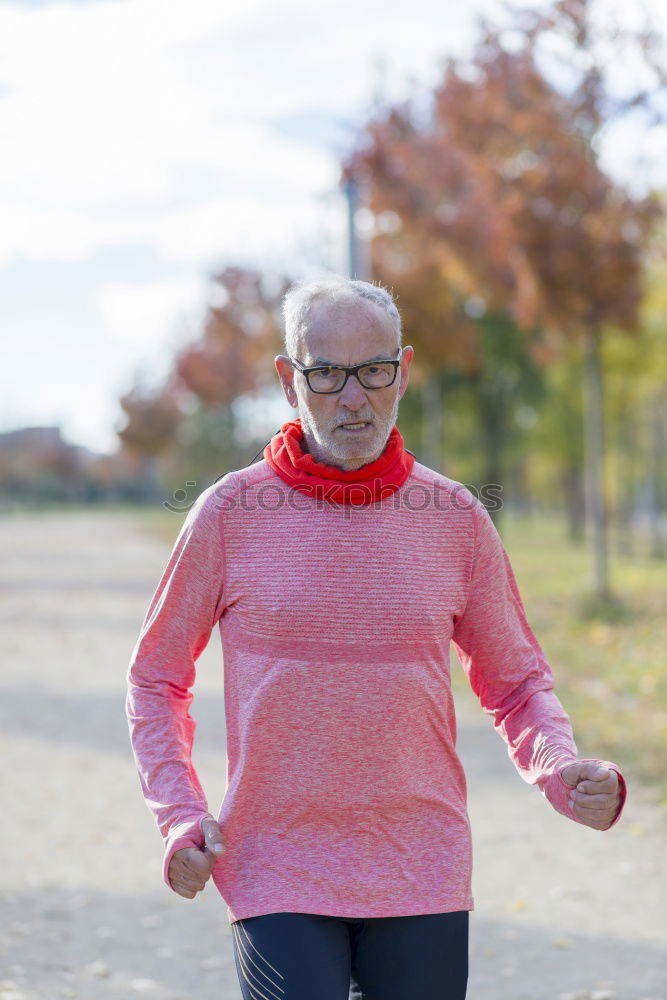 Similar – Image, Stock Photo Front view of one senior man wearing sportswear and eyeglasses