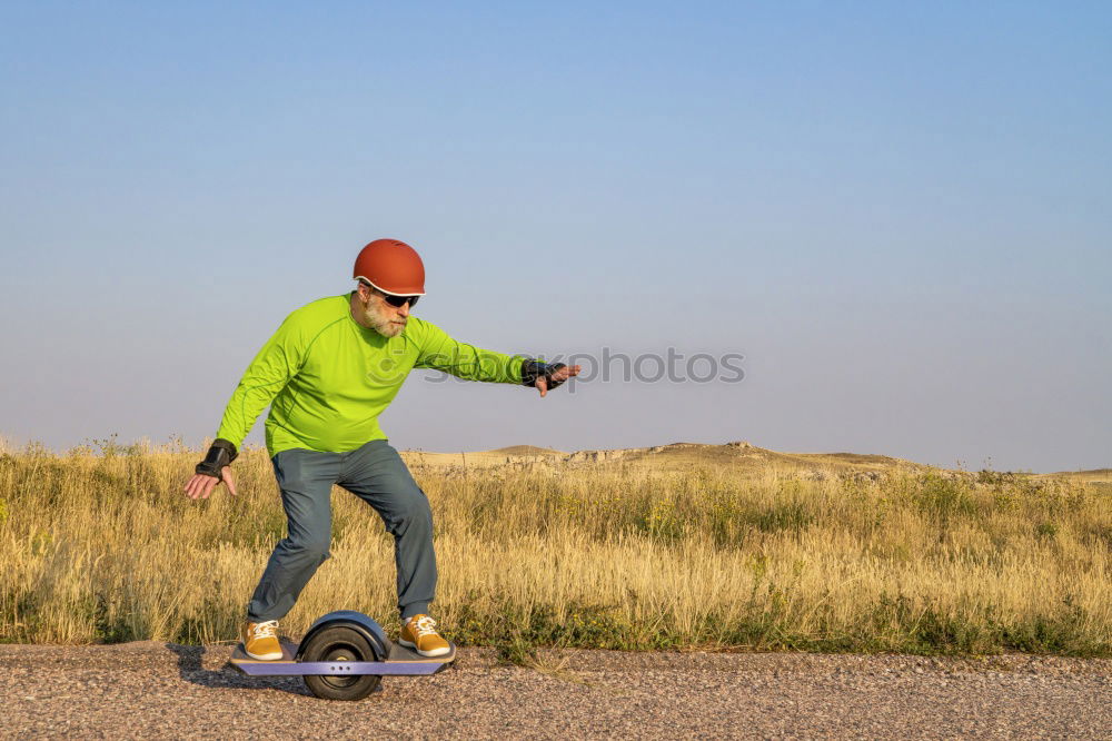 Image, Stock Photo Father and son standing on the road at the day time.