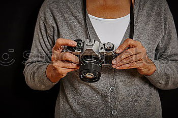 Similar – Polaroids woman with hand in front of face