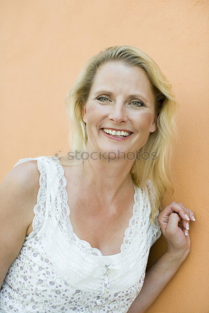 Similar – Middle Aged Woman Smiling Outdoors Portrait