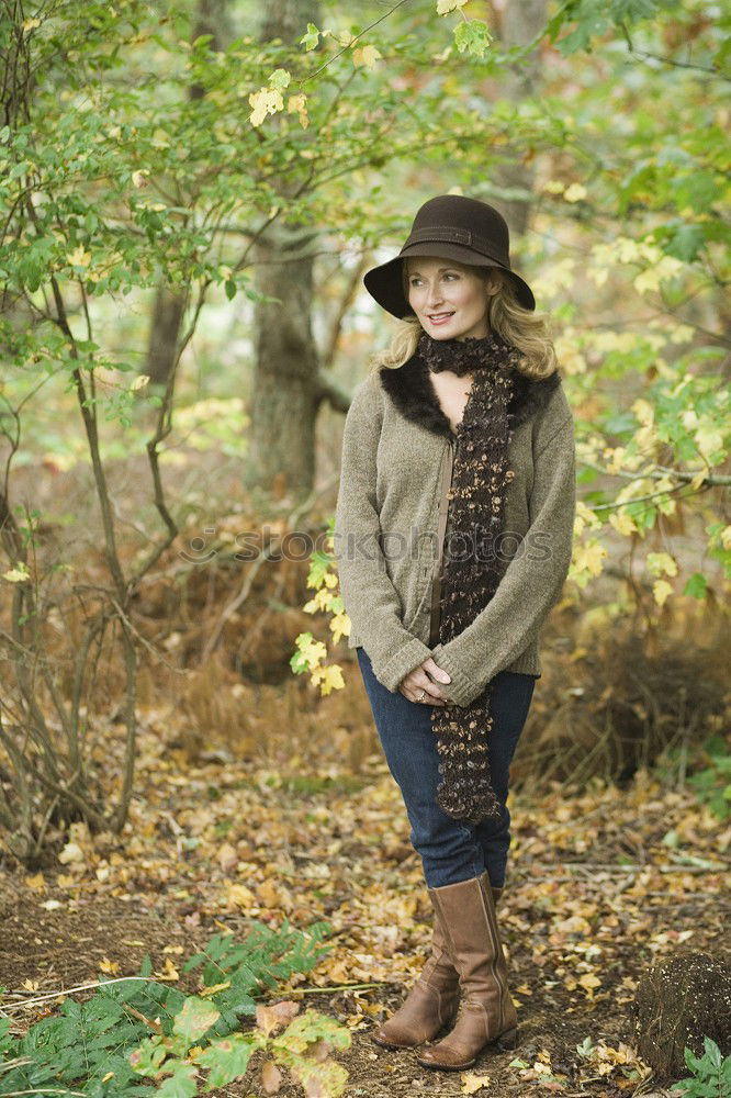 Similar – Image, Stock Photo young pregnant woman with long hair sits smiling on a tree trunk in the forest