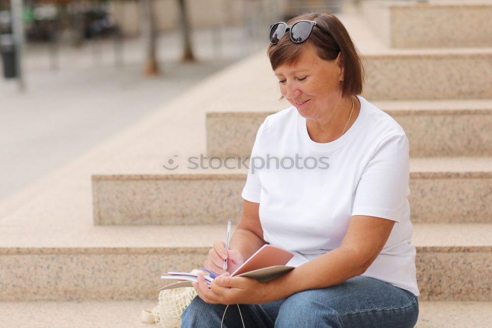 Similar – Image, Stock Photo Young woman sitting reading on urban steps