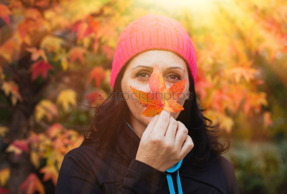 Similar – Matured woman with pink wool hat in the forest