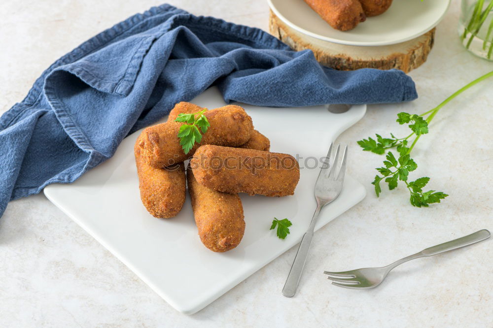 Similar – Image, Stock Photo Vegetable roasts from above on slate plate