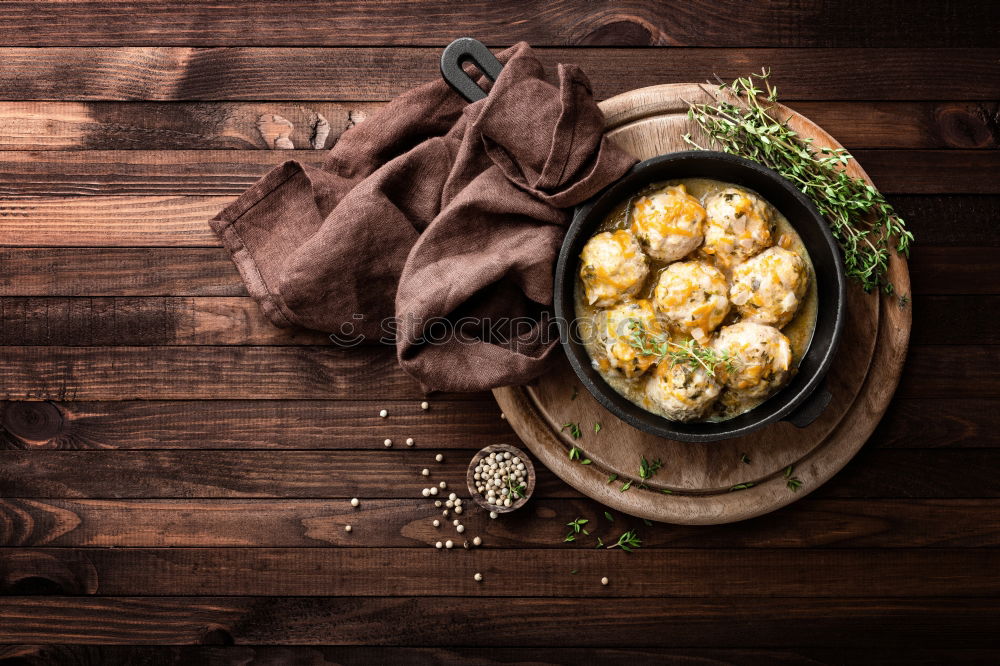 Similar – Vegetarian tortellini on the kitchen table with ingredients