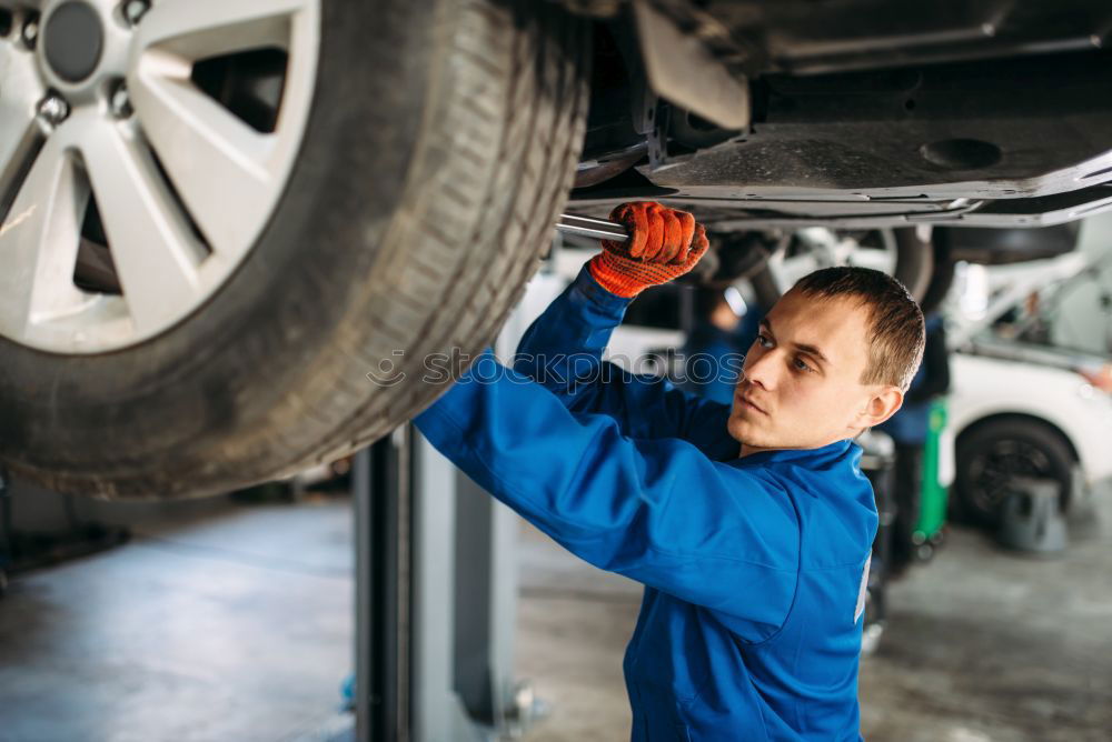 Similar – Professional Car Mechanic working.