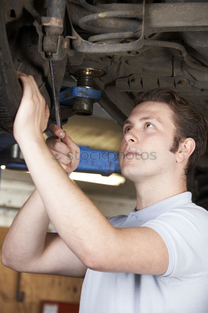 Similar – Person doing maintenance of bike