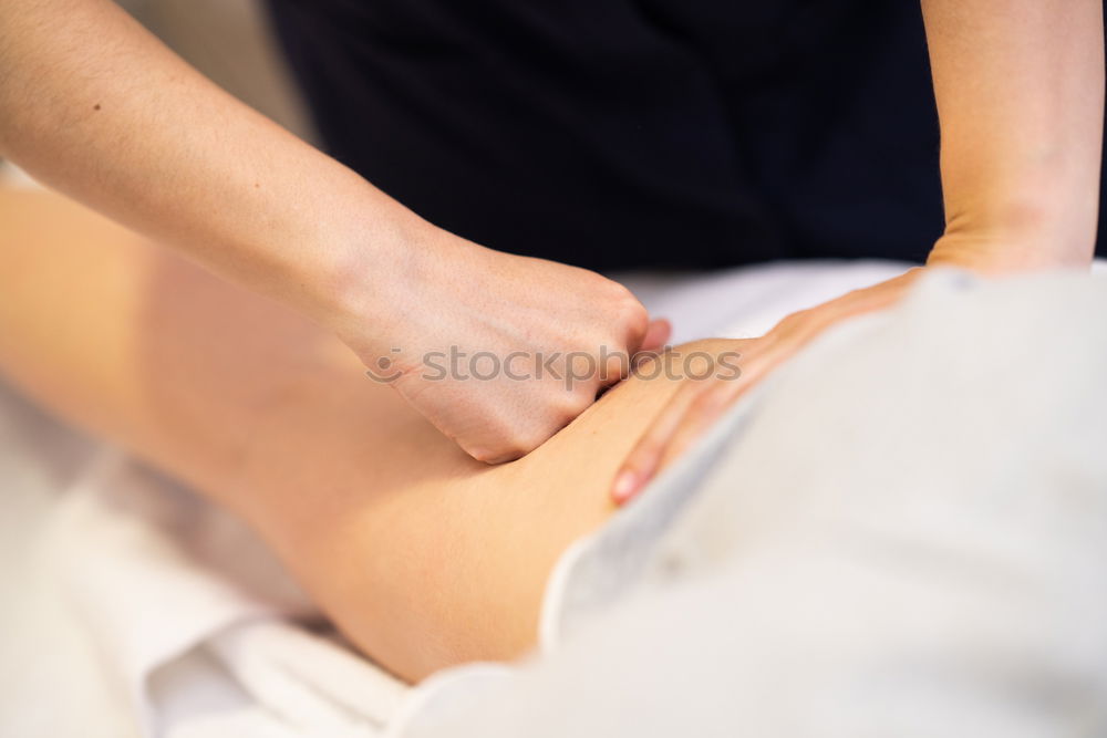 Similar – Image, Stock Photo Woman receiving massage on shoulders in clinical center