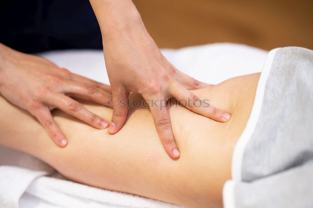 Similar – Image, Stock Photo Woman receiving massage on shoulders in clinical center