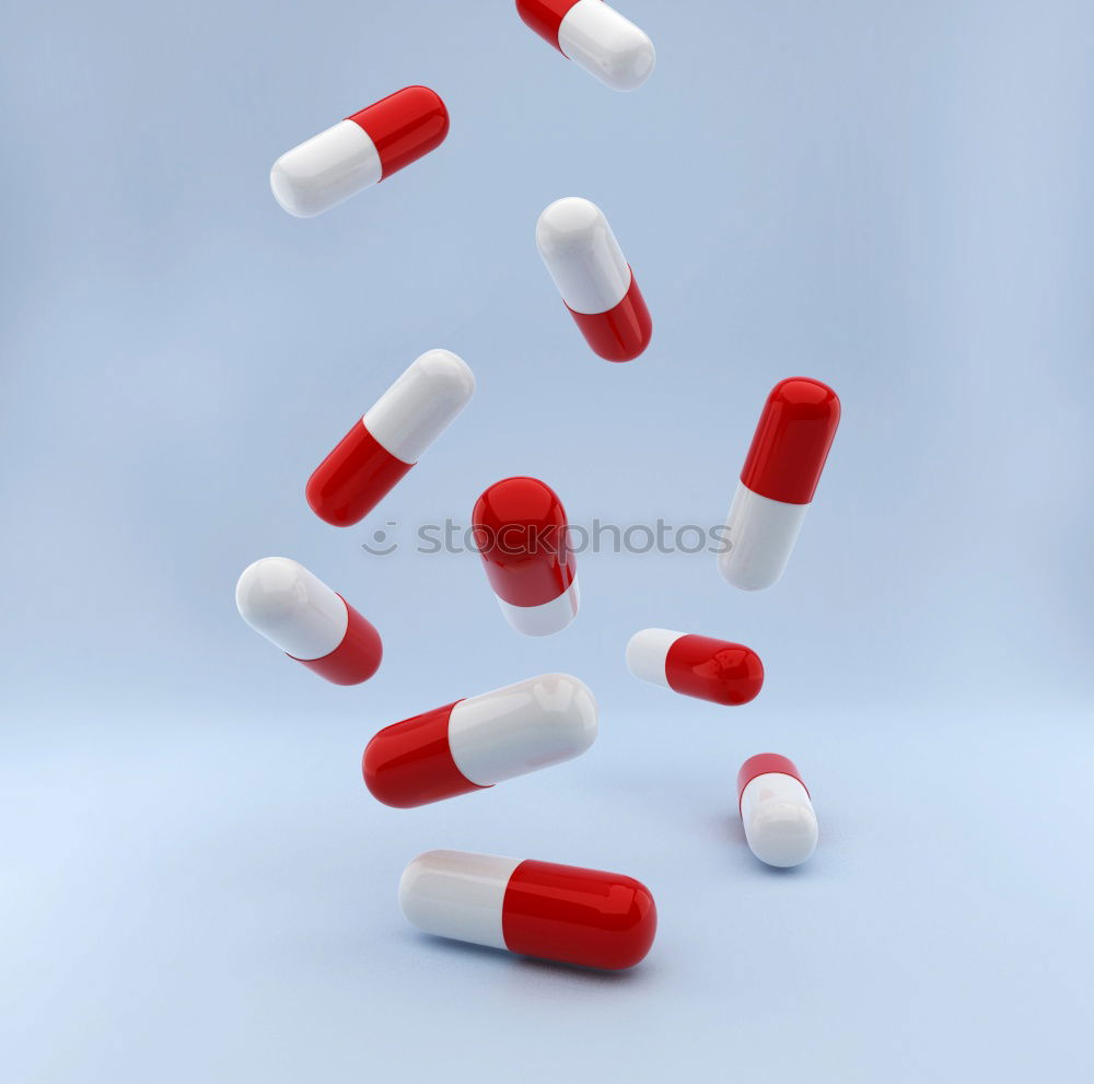 Similar – Image, Stock Photo Two capsule-shaped red and white pills made of paper