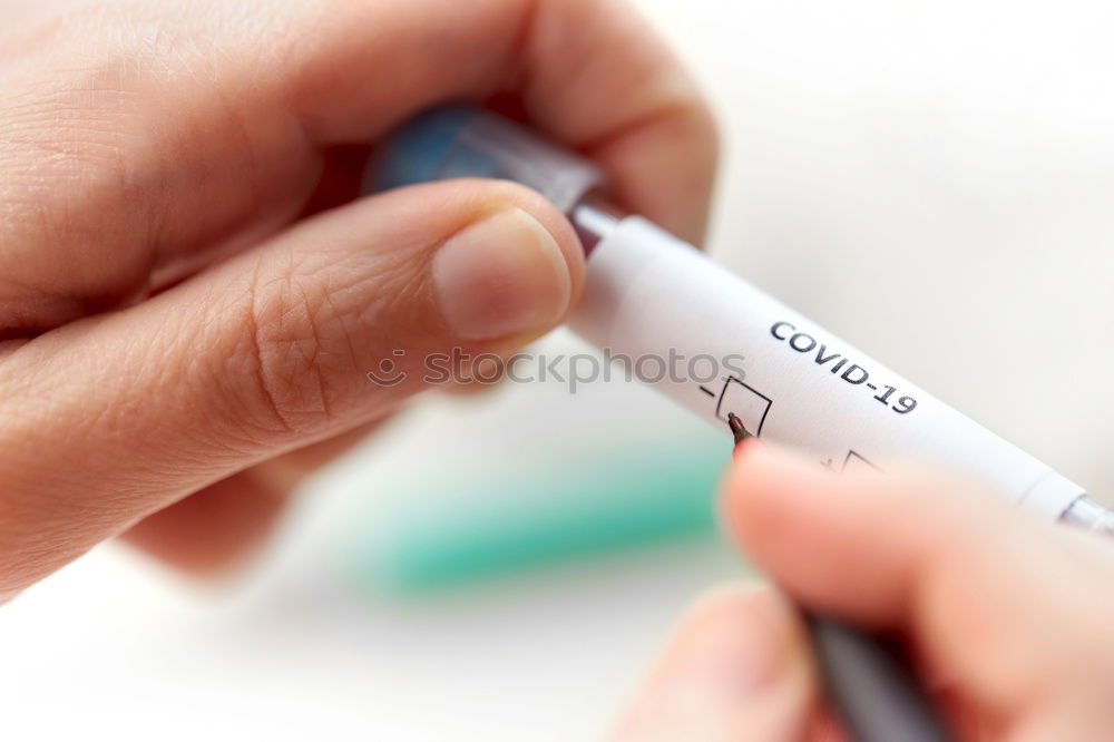 Similar – Medical thermometer 39 close up on colorful pink blurry background