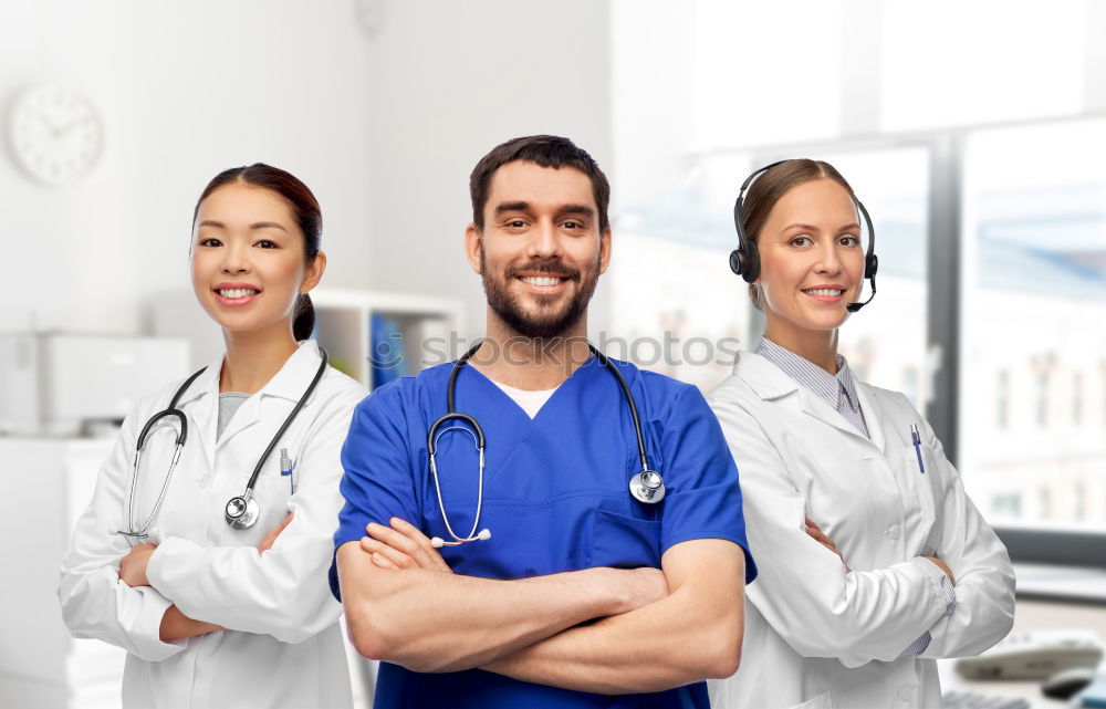 Similar – Smiling Female Doctor With Face Mask Wearing Scrubs In Busy Hospital During Health Pandemic