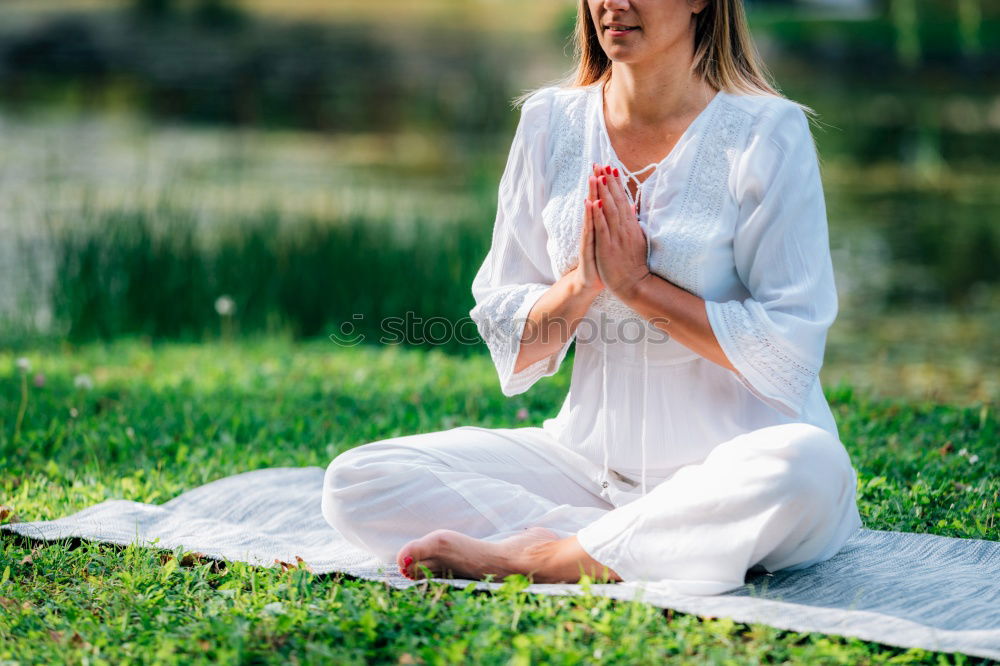 Similar – Image, Stock Photo Young woman doing yoga on wooden road in nature