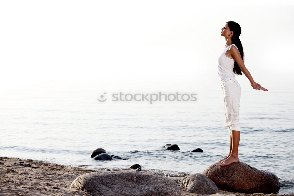 Similar – Image, Stock Photo Dreamy woman on rock at seaside