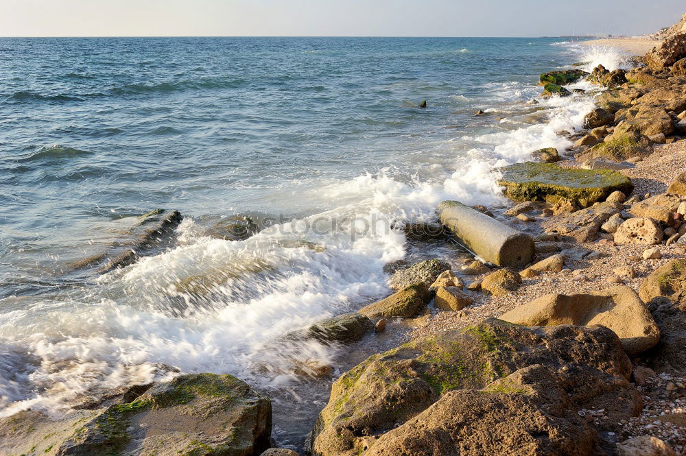 Similar – Stones as breakwaters