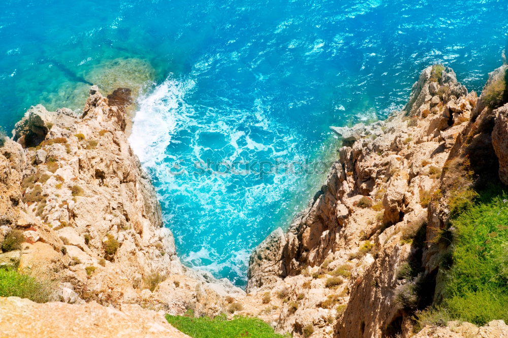 Ocean Landscape With Rocks And Cliffs At Lagos Bay Coast In Algarve, Portugal