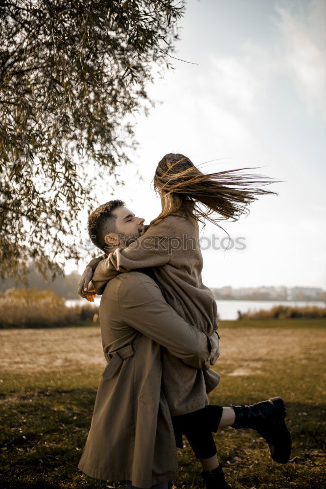 Similar – Image, Stock Photo Couple pausing while doing trekking