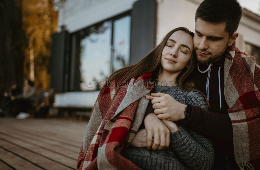 Similar – Smiling bearded man giving a piggy back to his girlfriend.