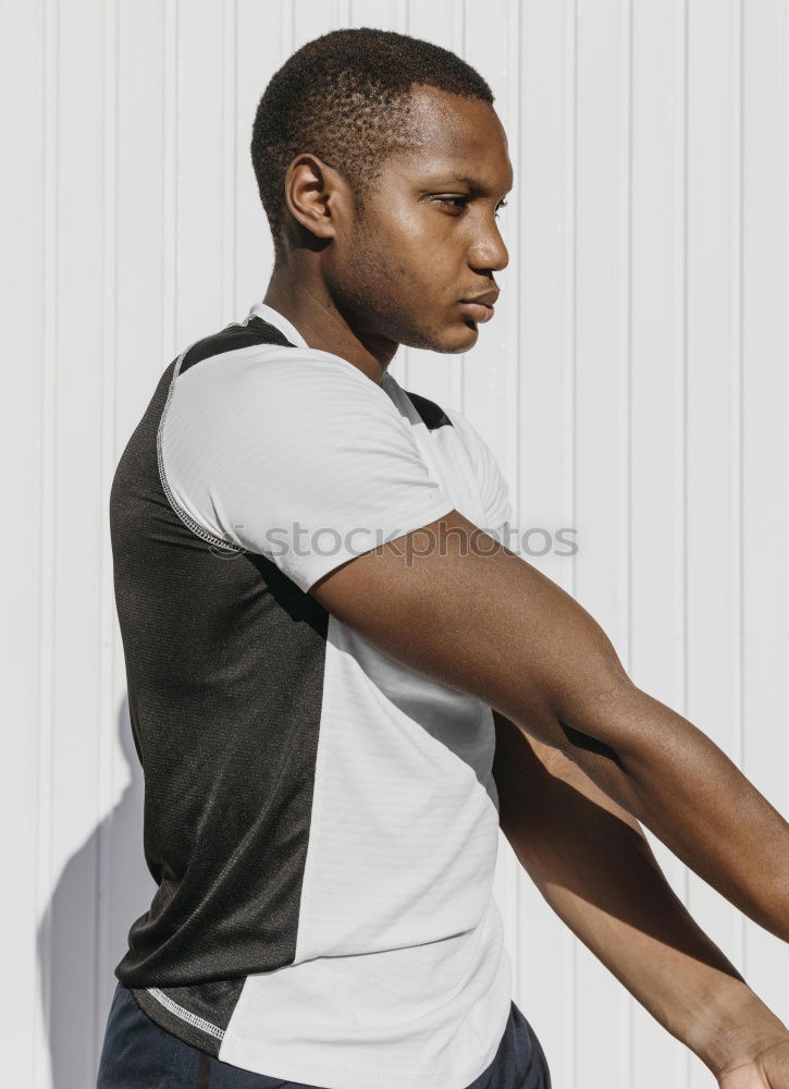 Similar – Black man posing on sports ground