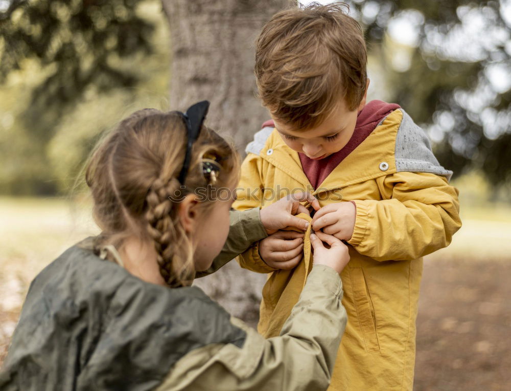 Similar – Image, Stock Photo Lady and children putting garbage in basket in park