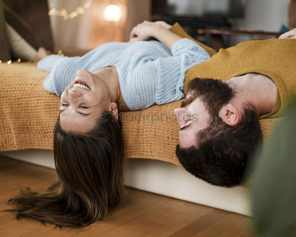 Similar – Image, Stock Photo Couple lying on couch Home