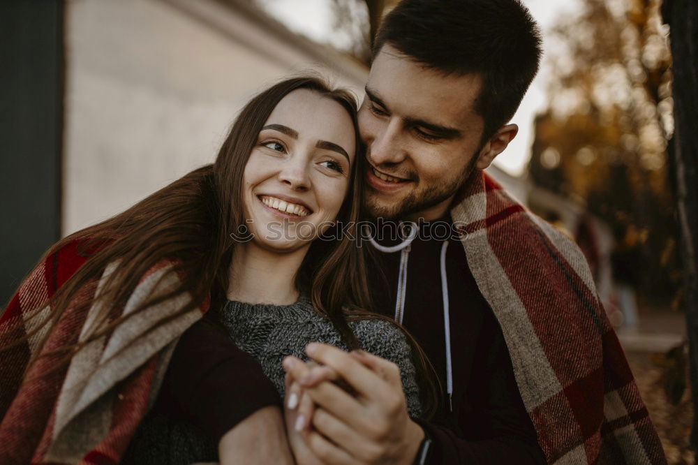 Couple in fir branches