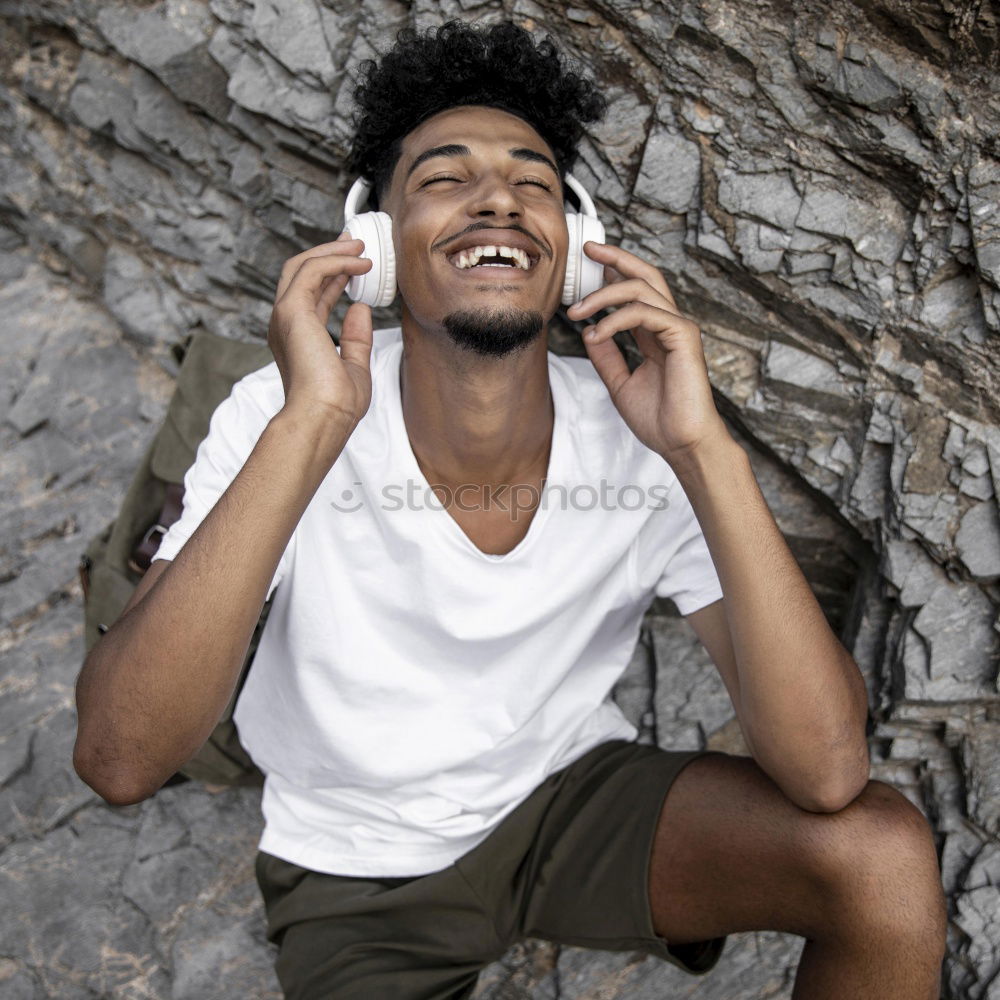 Similar – Afro young man using mobile phone and fixed gear bicycle.