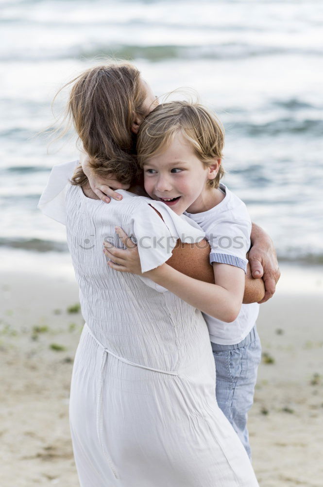 Similar – Sister and brother playing on the beach