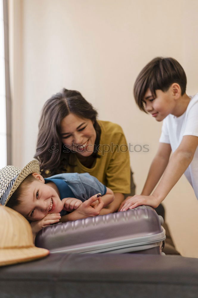 Similar – Image, Stock Photo Boy and girl reading a book