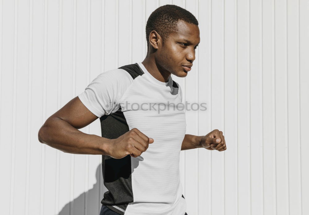 Similar – Image, Stock Photo Attractive black man running in urban background.