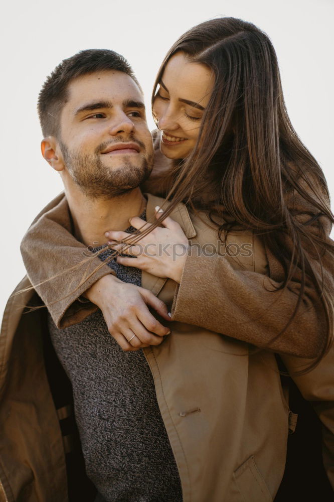 Similar – Smiling couple of lovers having fun.